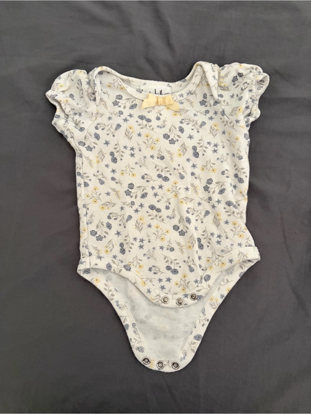 Nicole Miller Cream Short-Sleeve Bodysuit with Blue & Yellow Floral Detail & Bow